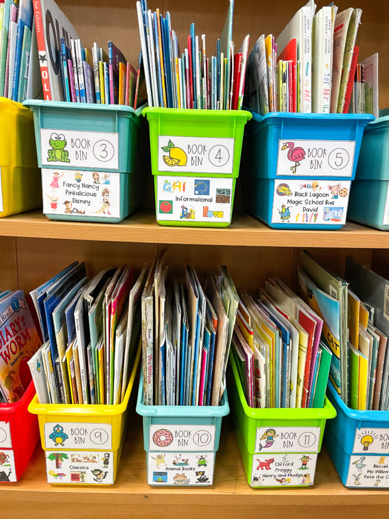 early elementary classroom library organization with bins organized by genre, author, or topic